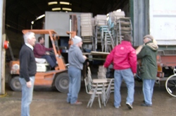 The team loads up the container lorry.